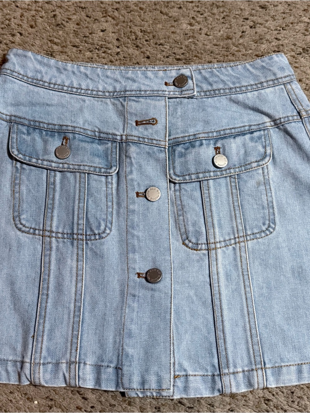 Retro Vibes: Light Wash Button-Front Denim Mini Skirt